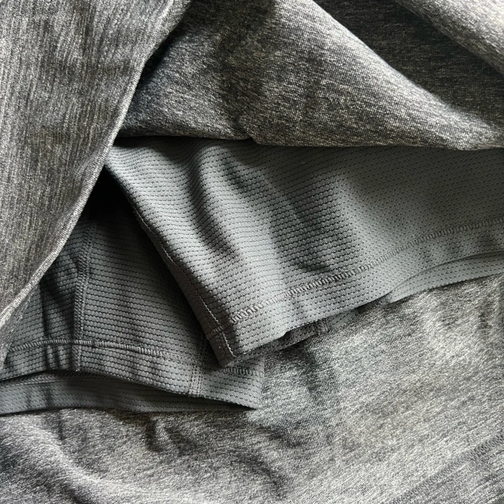 Athleta Excursion Hybrid Mid-Rise Tennis Skort in Dark Heathered Gray Size XS